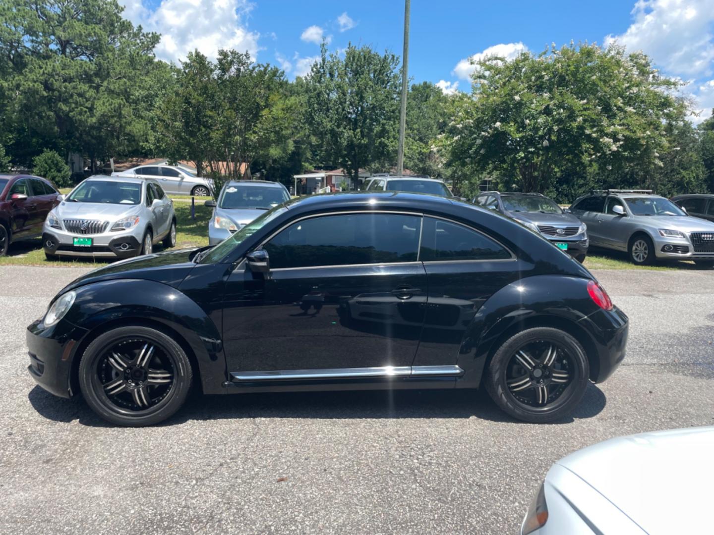 2012 BLACK VOLKSWAGEN BEETLE 2.5L PZEV (3VWJP7AT0CM) with an 2.5L engine, Automatic transmission, located at 5103 Dorchester Rd., Charleston, SC, 29418-5607, (843) 767-1122, 36.245171, -115.228050 - Local Trade-in with Leather, CD/AUX/Bluetooth, Hands-free Phone, Power Windows, Power Locks, Power Mirrors, All-weather Mats, Keyless Entry, Alloy Wheels. Clean CarFax (no accidents reported!) Only 68k miles! Located at New Life Auto Sales! 2023 WINNER for Post & Courier's Charleston's Choice Pre - Photo#3